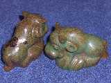 Bulls with cursive holes glazed green